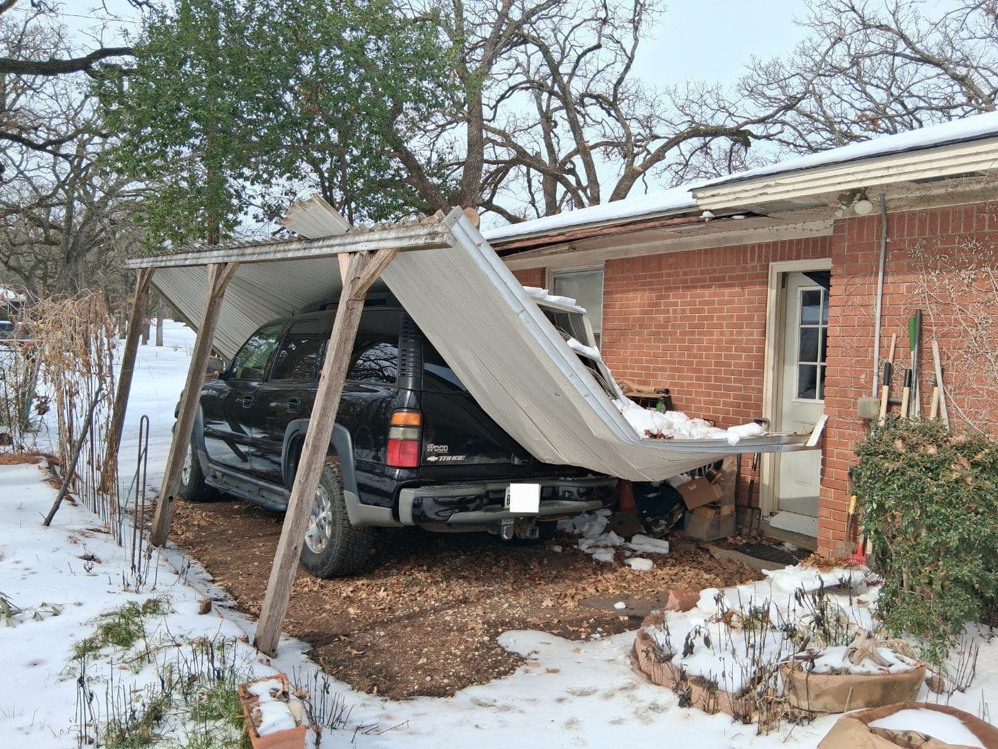 Project Dealing with Winter Storm Damage - Roof and Driveway Cover Repair image