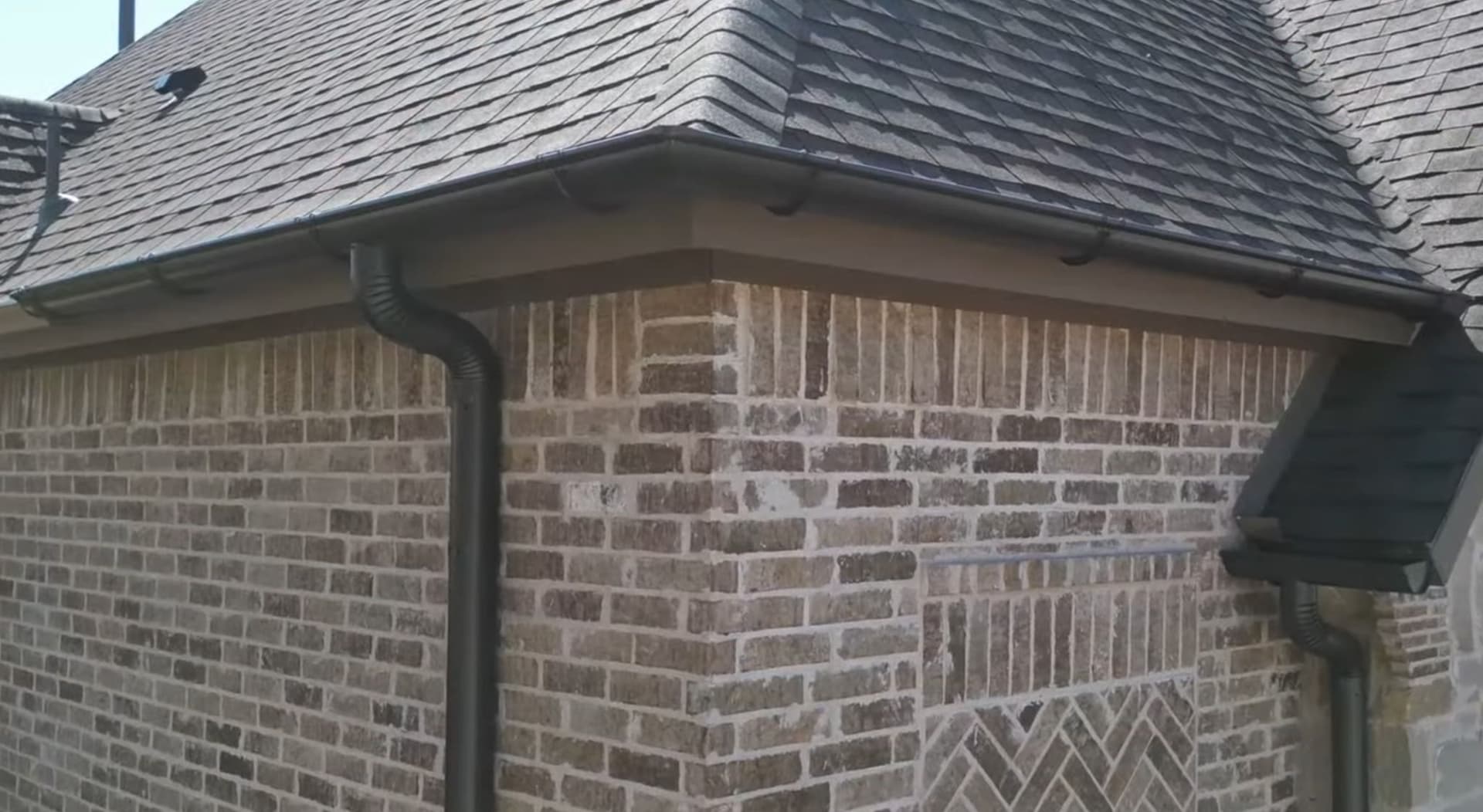 Sleek Half-Round Gutters Installed on Modern Home image