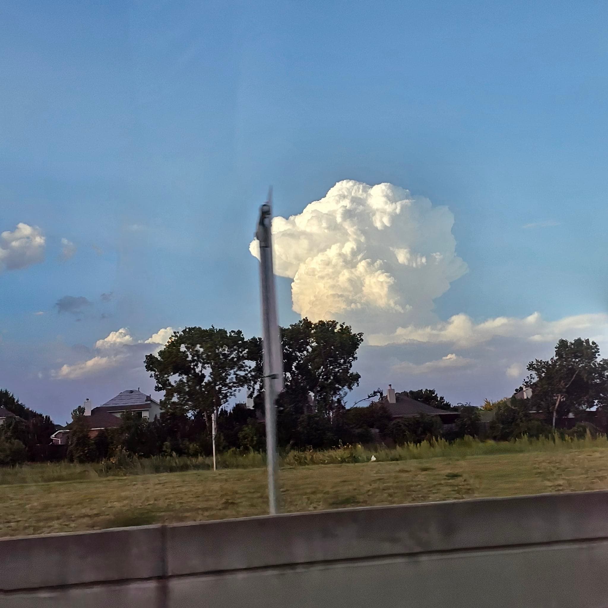 Project McKinney's Majestic Storm Clouds and Roof Safety image